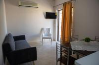 A television and/or entertainment centre at Vasileiou Apartments