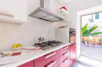 Kuchyňa alebo kuchynka v ubytovaní Sansevero Family Apartment by Wonderful Italy