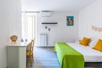 Posteľ alebo postele v izbe v ubytovaní Sansevero Family Apartment by Wonderful Italy