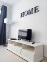 TV a/nebo společenská místnost v ubytování Casa Elsa appartamento incantevole Corralejo