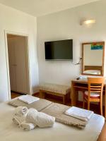 Posteľ alebo postele v izbe v ubytovaní Rooms Vinka Tudor