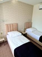 Łóżko lub łóżka w pokoju w obiekcie Via Hotel Polkowice