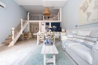 Posezení v ubytování Le Méditarranéen de COUP DE COEUR APPARTEMENTS