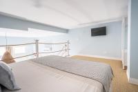 Postel nebo postele na pokoji v ubytování Le Méditarranéen de COUP DE COEUR APPARTEMENTS