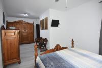 TV a/nebo společenská místnost v ubytování Apartamentos Daniela 2
