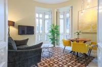Televízia a/alebo spoločenská miestnosť v ubytovaní Madeinterranea Apartments