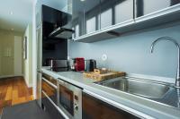 Kuchyňa alebo kuchynka v ubytovaní Madeinterranea Apartments