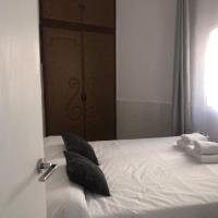 Posteľ alebo postele v izbe v ubytovaní Apartamentos Toledo Casa Galería de los Aljibes