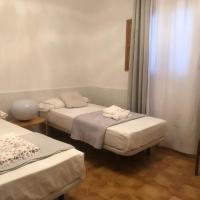 Posteľ alebo postele v izbe v ubytovaní Apartamentos Toledo Casa Galería de los Aljibes