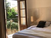 Posteľ alebo postele v izbe v ubytovaní Apartamentos Toledo Casa Galería de los Aljibes
