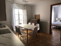 Posteľ alebo postele v izbe v ubytovaní Apartamentos Toledo Casa Galería de los Aljibes