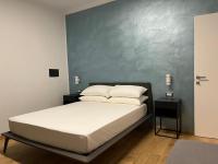 Łóżko lub łóżka w pokoju w obiekcie Adriatico Luxury Apartments