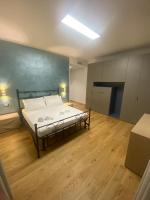 Łóżko lub łóżka w pokoju w obiekcie Adriatico Luxury Apartments