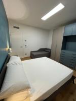 Łóżko lub łóżka w pokoju w obiekcie Adriatico Luxury Apartments