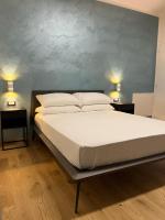 Łóżko lub łóżka w pokoju w obiekcie Adriatico Luxury Apartments
