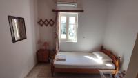 Postel nebo postele na pokoji v ubytování Angelos Rooms