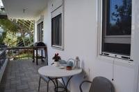 A balcony or terrace at happy2 Dafni Family home near Athens, airport, ports