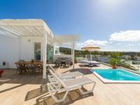 The swimming pool at or close to Pasitoblanco Porto Mare 7 Seaview Villa private heated pool