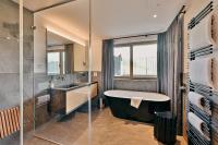 A bathroom at Chalet Hohe Welt - luxury apartments