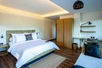 Tira Vilagna Suites & Spaにあるベッド