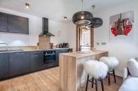 Kuchnia lub aneks kuchenny w obiekcie Echo du Pleney B103