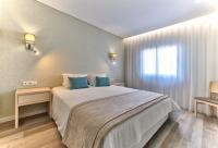Postel nebo postele na pokoji v ubytování Agua Hotels Vila Branca