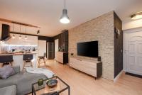 Televízia a/alebo spoločenská miestnosť v ubytovaní L&R luxury apartment- free parking