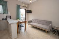 A television and/or entertainment centre at Vasileiou Apartments