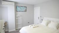 A bed or beds in a room at Slappe Jaén I
