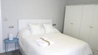 A bed or beds in a room at Slappe Jaén I