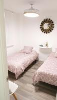 A bed or beds in a room at Slappe Jaén I