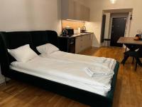 Posteľ alebo postele v izbe v ubytovaní Apartamenty Rynek 5