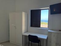 A television and/or entertainment centre at Low Island House