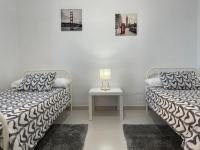 A bed or beds in a room at Low Island House
