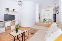 A television and/or entertainment centre at Victoria City Center Apartment