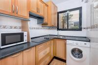 A kitchen or kitchenette at Victoria City Center Apartment