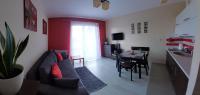 Televízia a/alebo spoločenská miestnosť v ubytovaní Apartament Zdrojowy Jastrzębia Góra