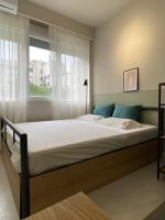 Postel nebo postele na pokoji v ubytování E2G URBAN STAY, #E