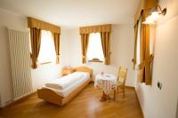 Posteľ alebo postele v izbe v ubytovaní Hotel Fior Di Bosco
