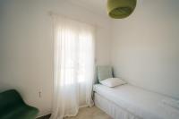Postel nebo postele na pokoji v ubytování La Maison de Lilac-Luxurious Olive Grove apartments