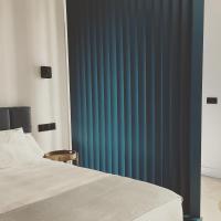 Łóżko lub łóżka w pokoju w obiekcie VIDAL APARTAMENTOS con parking privado.