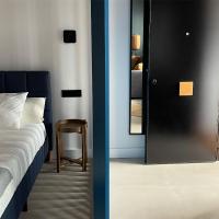 Łóżko lub łóżka w pokoju w obiekcie VIDAL APARTAMENTOS con parking privado.