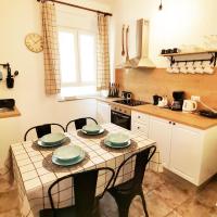 Kuchyňa alebo kuchynka v ubytovaní APARTMAN FLAVIA