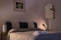 A bed or beds in a room at 4 Camere A Trani