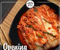 a pan of food with a dish of sauce at Premium Hotel Ulaanbaatar in Ulaanbaatar