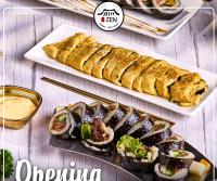 a table with two plates of sushi and chopsticks at Premium Hotel Ulaanbaatar in Ulaanbaatar