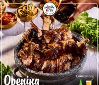 a bowl of food with meat and vegetables on a table at Premium Hotel Ulaanbaatar in Ulaanbaatar