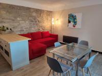 Posedenie v ubytovaní Auberge des Espérels Rez de maison avec Jardin