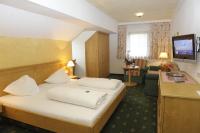 Łóżko lub łóżka w pokoju w obiekcie Hotel Stegmühlhof