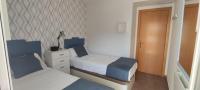 Postel nebo postele na pokoji v ubytování TOYO Apartamento golf y playa